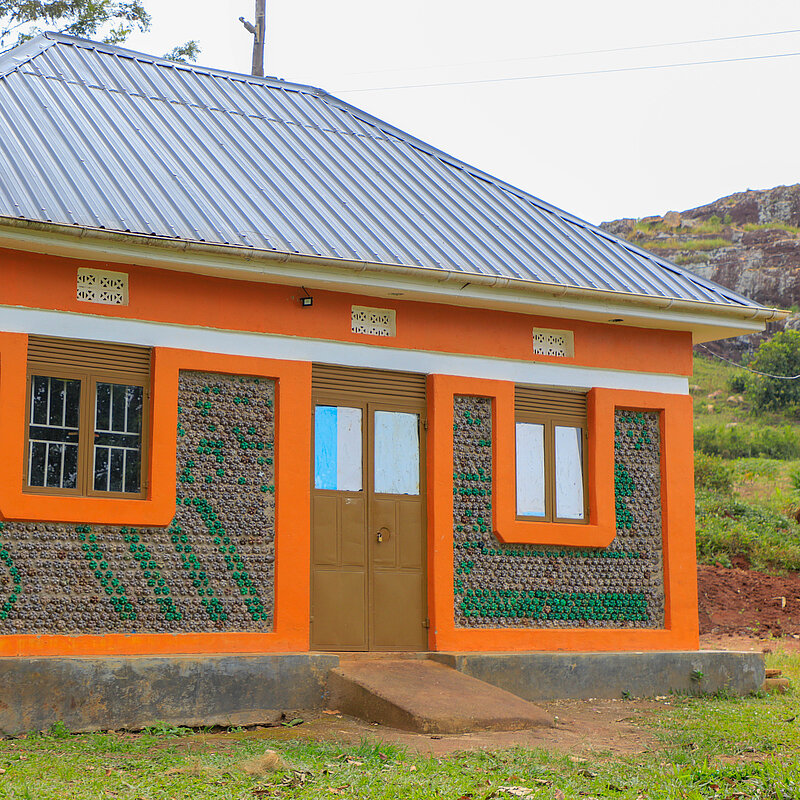 Houses made from plastic bottles? Yes, that exists!
